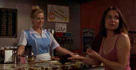 By Appointment Only Woman customer and waitress in a diner