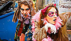 Two teenage girls dressed in fantastical costumes