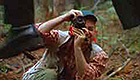 Man takes a photograph of a suicide victim