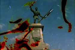 Yanqui WALKER and the OPTICAL REVOLUTION Film still featuring a statue