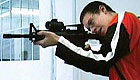 Man holding a rifle