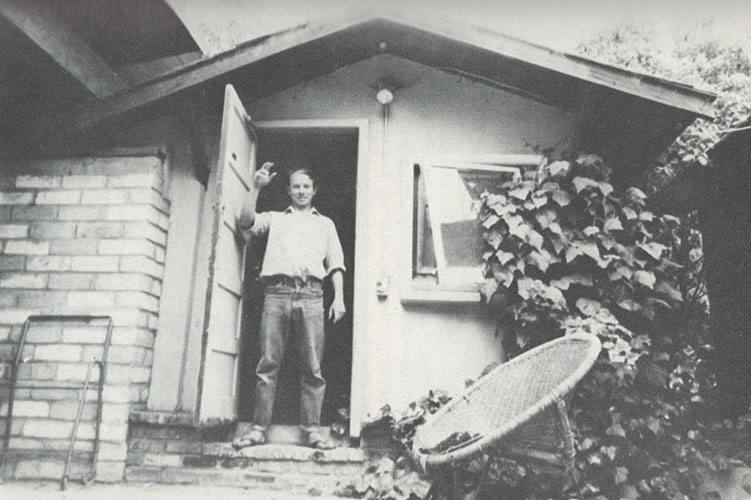 Bruce Baillie standing in a doorway